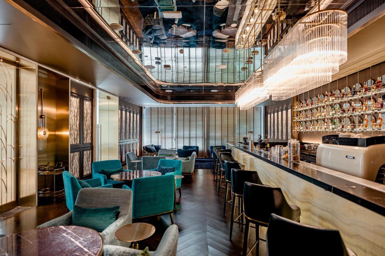Silq Hotel & Residence, Managed By The Ascott Limited Bangkok Extérieur photo The bar at the 100 Queen's Gate